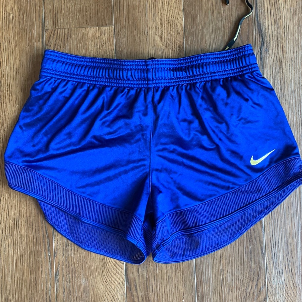 Blue Nike shorts.